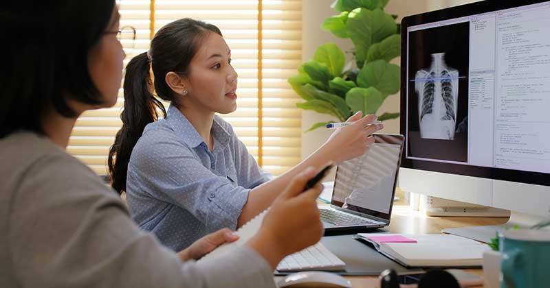 Business staff watching laptop