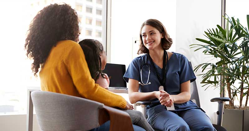 Doctor talking with patients