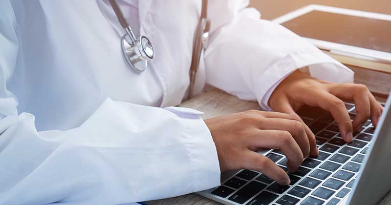 DOCTOR-TYPING-KEYBOARD